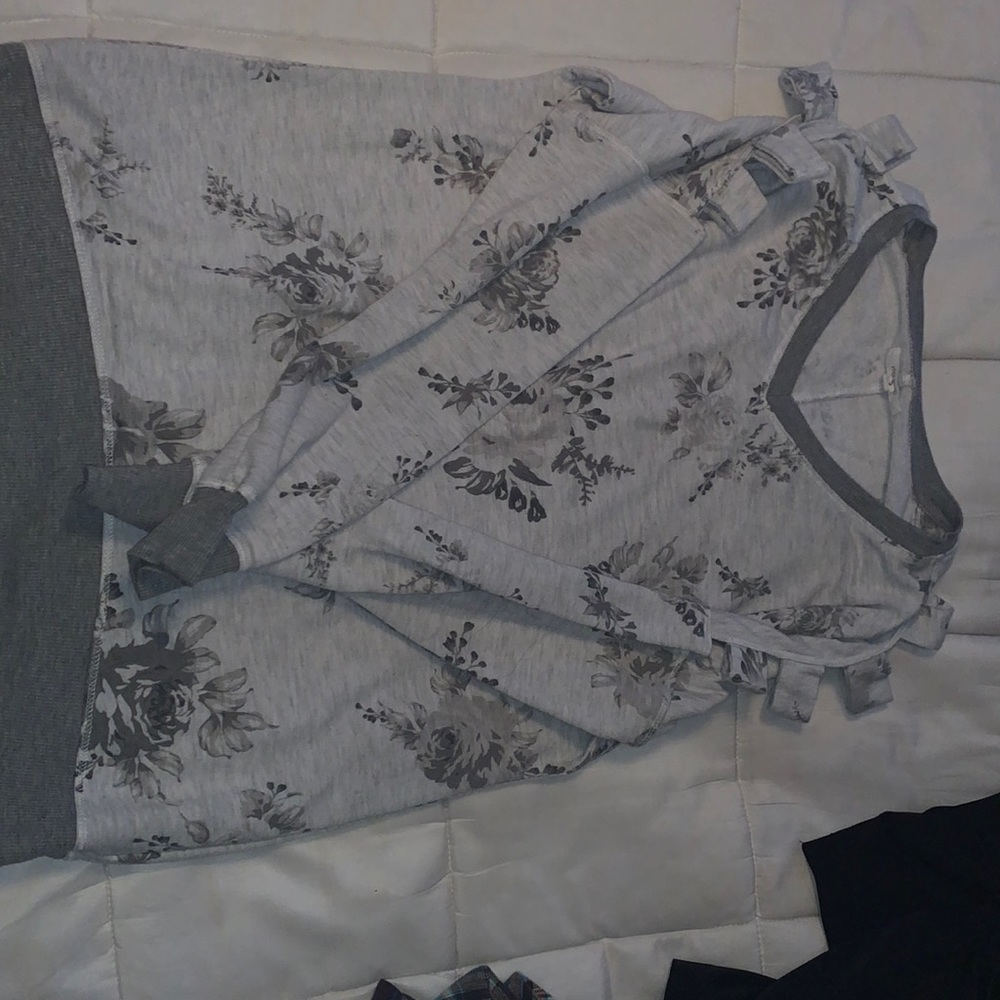 A grey/white top w flowers size small
